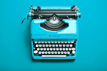 Brainstorm for writers, retro typewriter on blue background. Cre