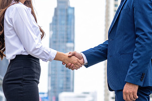 Business Handshake in Modern City Setting, a Business Photo by Davizro's Market