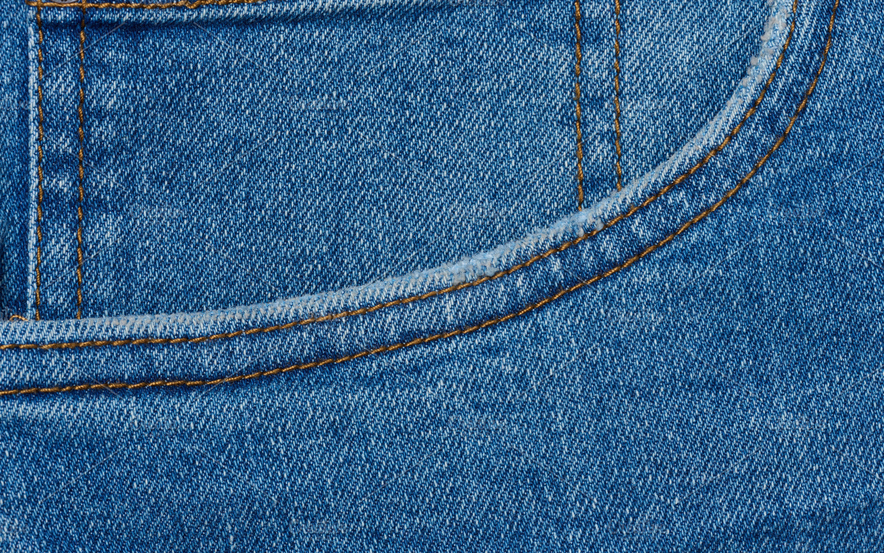 Blue jeans front pocket, close up, a Background Photo by ndanko