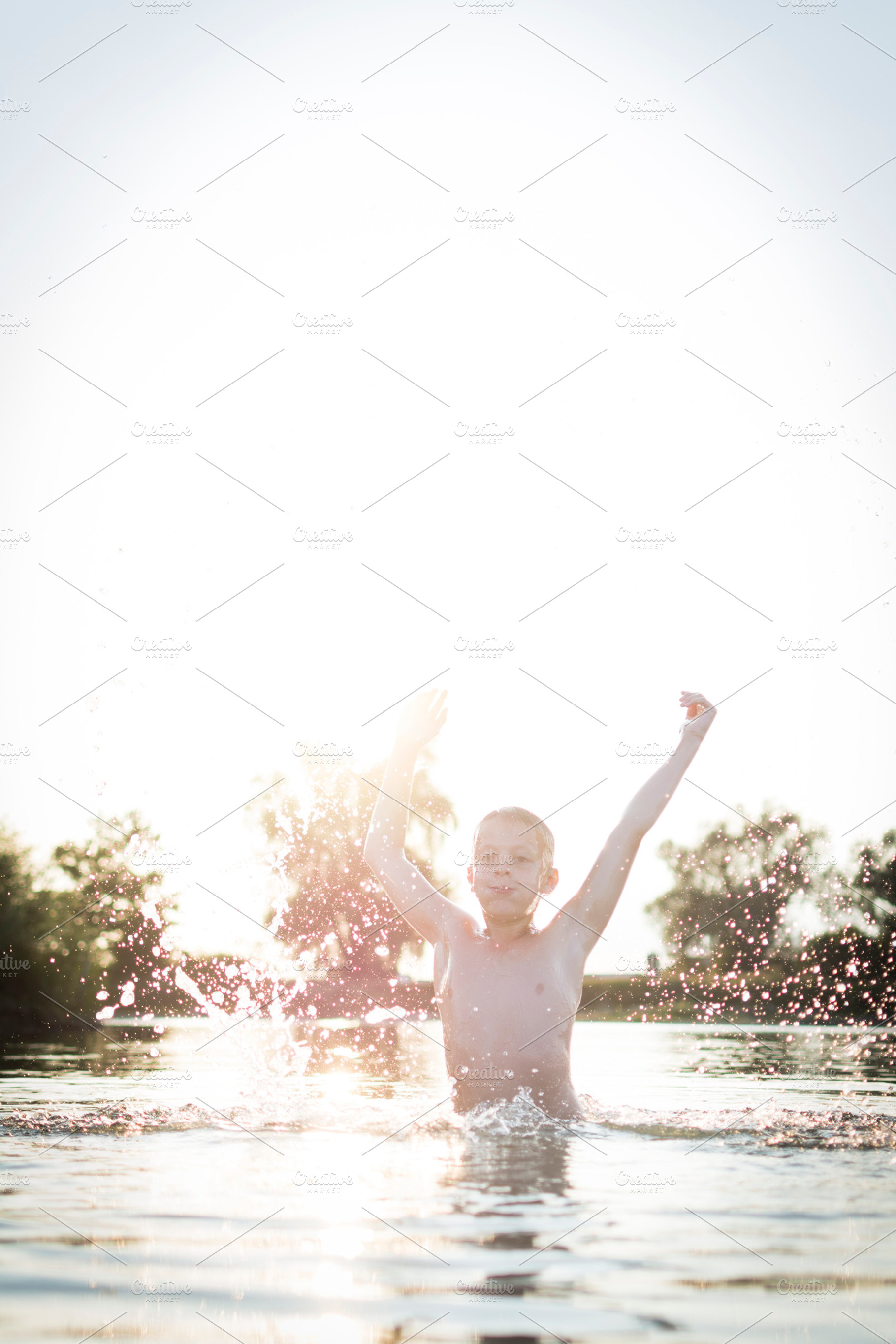 Summer at the lake containing outdoor, wet, and fun, a Person Photo by Twin Design