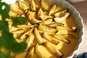 Preparing homemade plum tart for baking dessert, a Food & Drink Photo by Olena Rudo