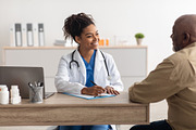 Young black doctor explaining treatment plan to male patient, a Photo by Prostock-Studio (Thumbnail 1 of 2)