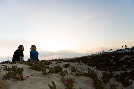 Engagement Couple Sitting on Beach preview 6
