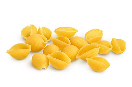 Uncooked dried conchiglie. Raw, a Food & Drink Photo by NataPhoto