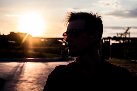 silhouette of young handsome man in sunglasses outside against the sunset, a Beauty & Fashion Photo by Mikee's stuff