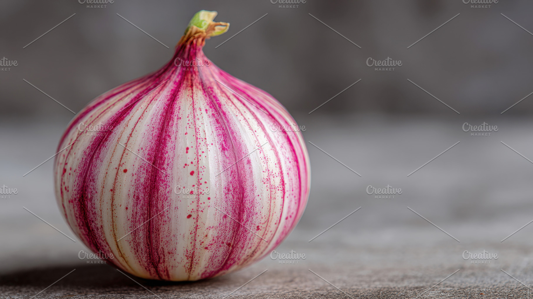 Unique striped onion on wooden table, a Photo by Beautiful things