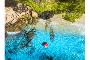 Aerial view of woman on pink, a Nature Photo by den-belitsky