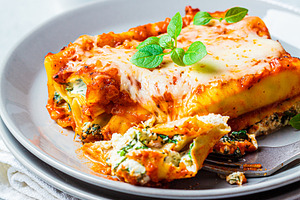 Ricotta and spinach cannelloni containing bake, basil, and canelloni