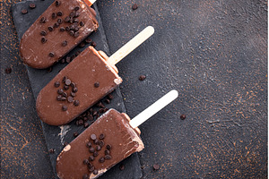 Chocolate ice cream popsicles in, a Food & Drink Photo by Yulia Furman