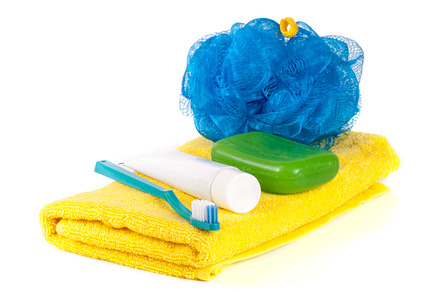 Hygiene products soap toothbrush and paste loofah towel isolated on white, a Beauty & Fashion Photo by NataPhoto