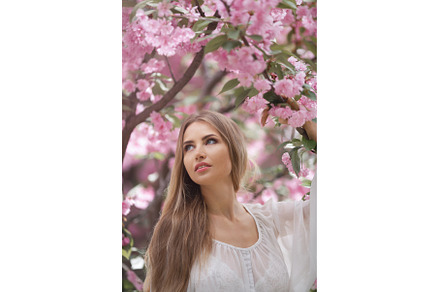 Woman at Blossoming Sakura Tree on, a Beauty & Fashion Photo by Emotion photo