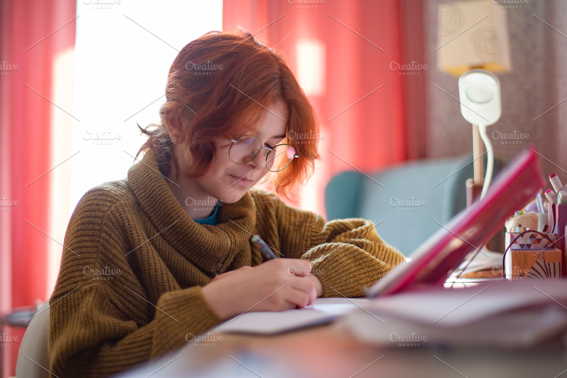 schoolgirl with glasses doing homework., a Photo by Pictures for you!!!!!!!!!