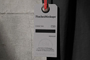 Paper Tag Hangs from T-Shirt Mockup, a Shirt Mockup by PinchesMockups© (Thumbnail 2 of 4)