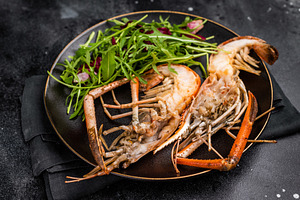 Elegant plate of grilled rosenbergii prawns shrimps garnished wi, a Food & Drink Photo by composter-box@mail.ru