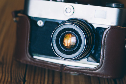 Vintage camera on wooden background featuring vintage, camera, and retro, a Technology Photo by PavelKant