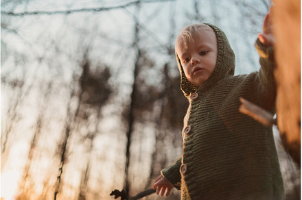 Little curious boy in knitted, a Person Photo by HalfPoint