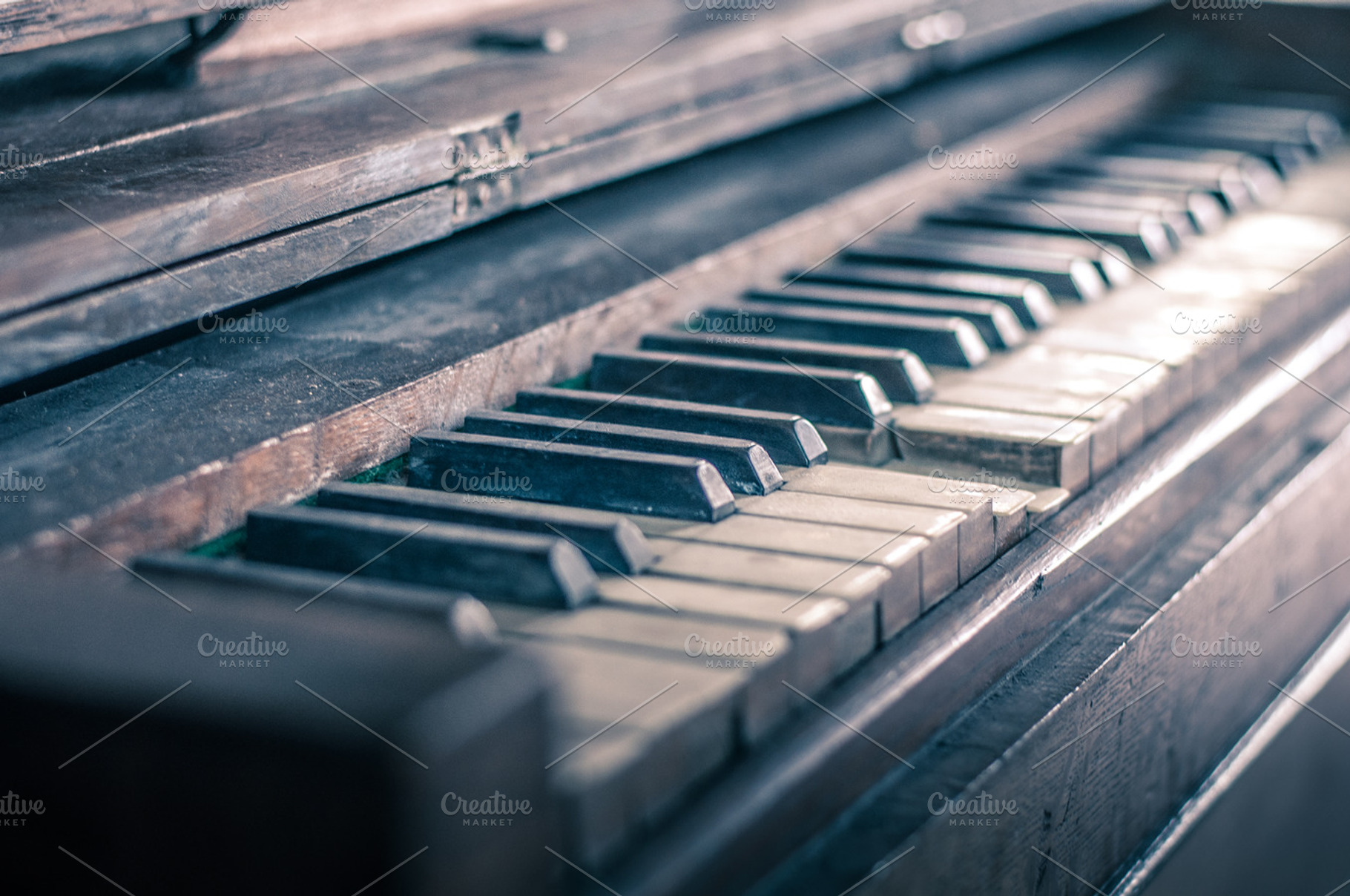 Antique piano stock photo containing music and piano, an Arts & Entertainment Photo by Mission Media