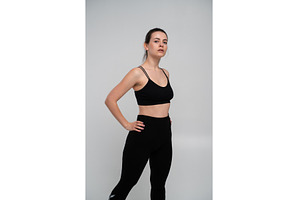 Young woman standing confidently in, a Sports & Recreation Photo by volodymyrshtun13795