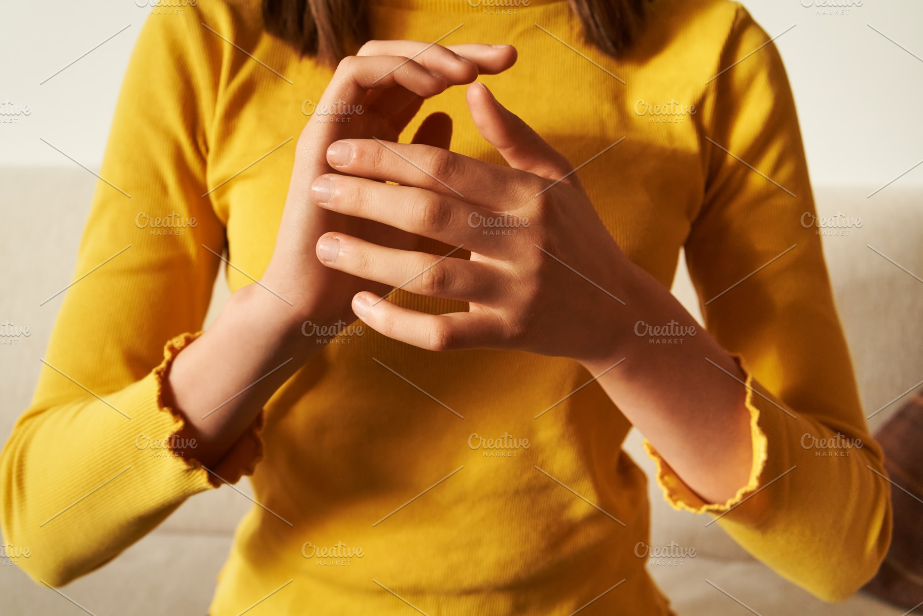 Teenage girl practicing EFT tapping - emotional freedom techniqu, a Health & Medical Photo by Madeleine Steinbach