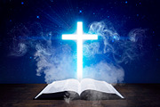 Glowing cross with Holy Bible, a Photo by Javier Art Photography