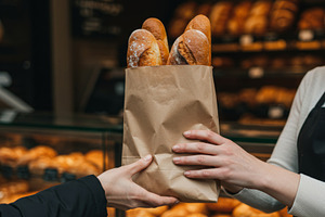 Fresh baguettes in a paper bag, a Food & Drink Photo by professorinc