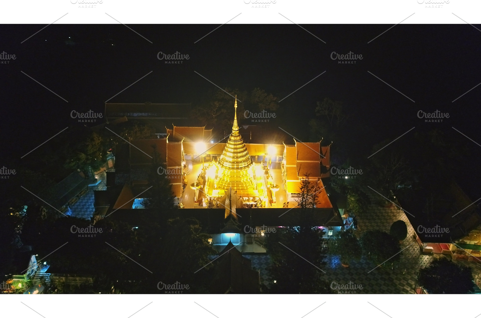 Golden pagoda shining at night in a, an Architecture Photo by Goinyk