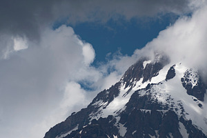 High Mount Kazbek slopes under dark storm clouds with blue sky p, a Photo by Pictures for you!!!!!!!!!