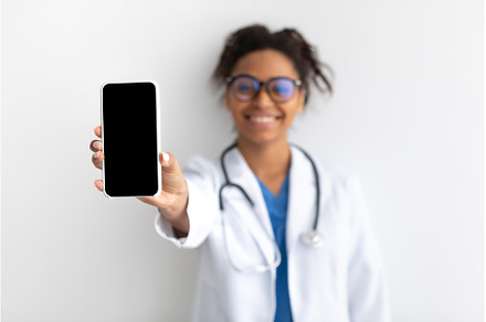 Doctor showing white empty, a Person Photo by Prostock-Studio