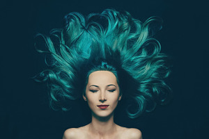 Beautiful girl with long hair containing woman, blue, and face