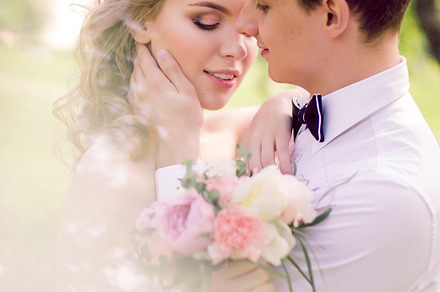Bride and groom with a bouquet containing bride, groom, and wedding, a Person Photo by SaulichPhoto