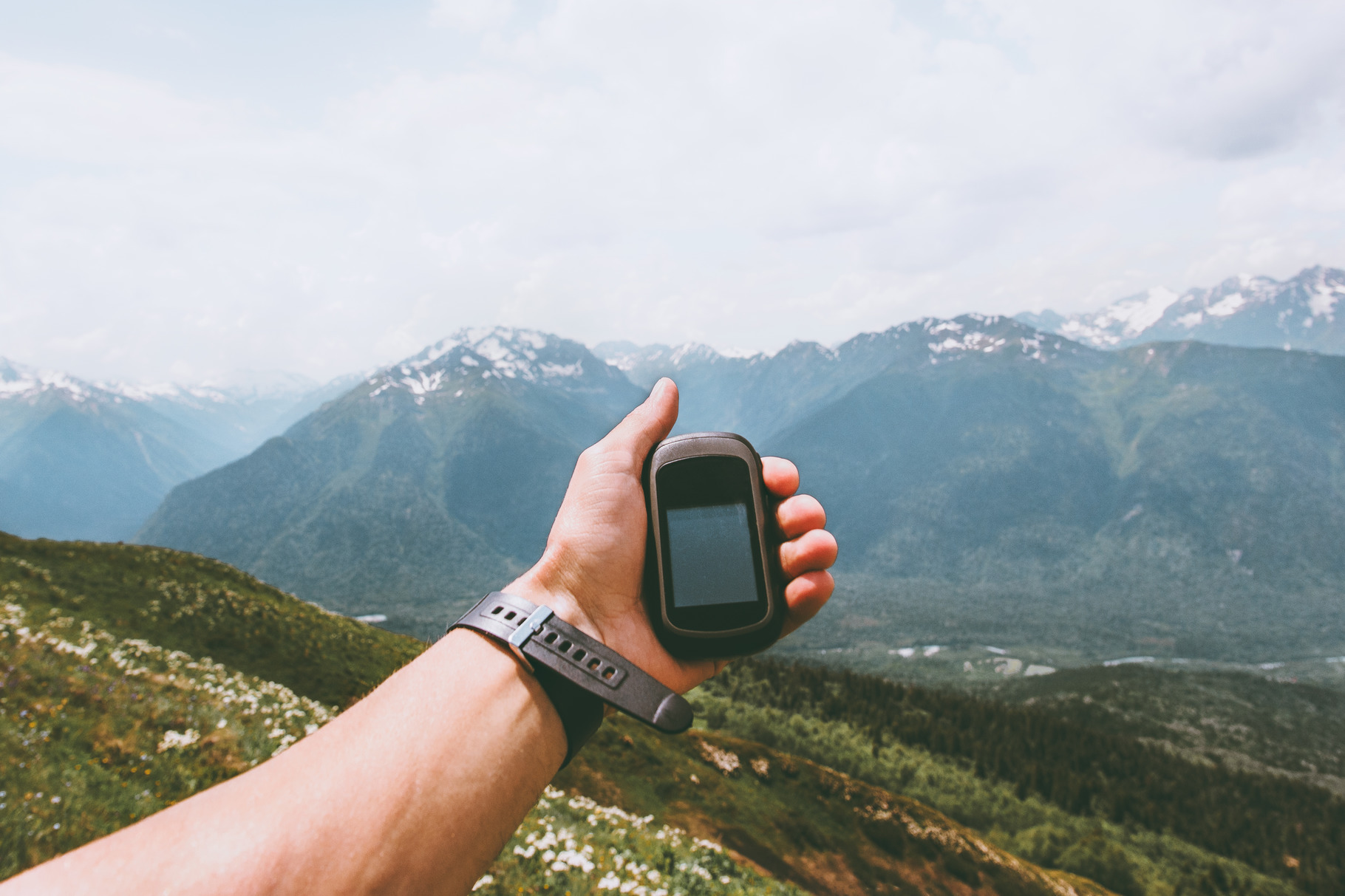 Traveler hand holding gps navigator, a Technology Photo by e v e r s t