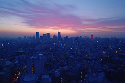 Dawn breaks over the Tokyo skyline w, a Photo by Iftikhar Alam