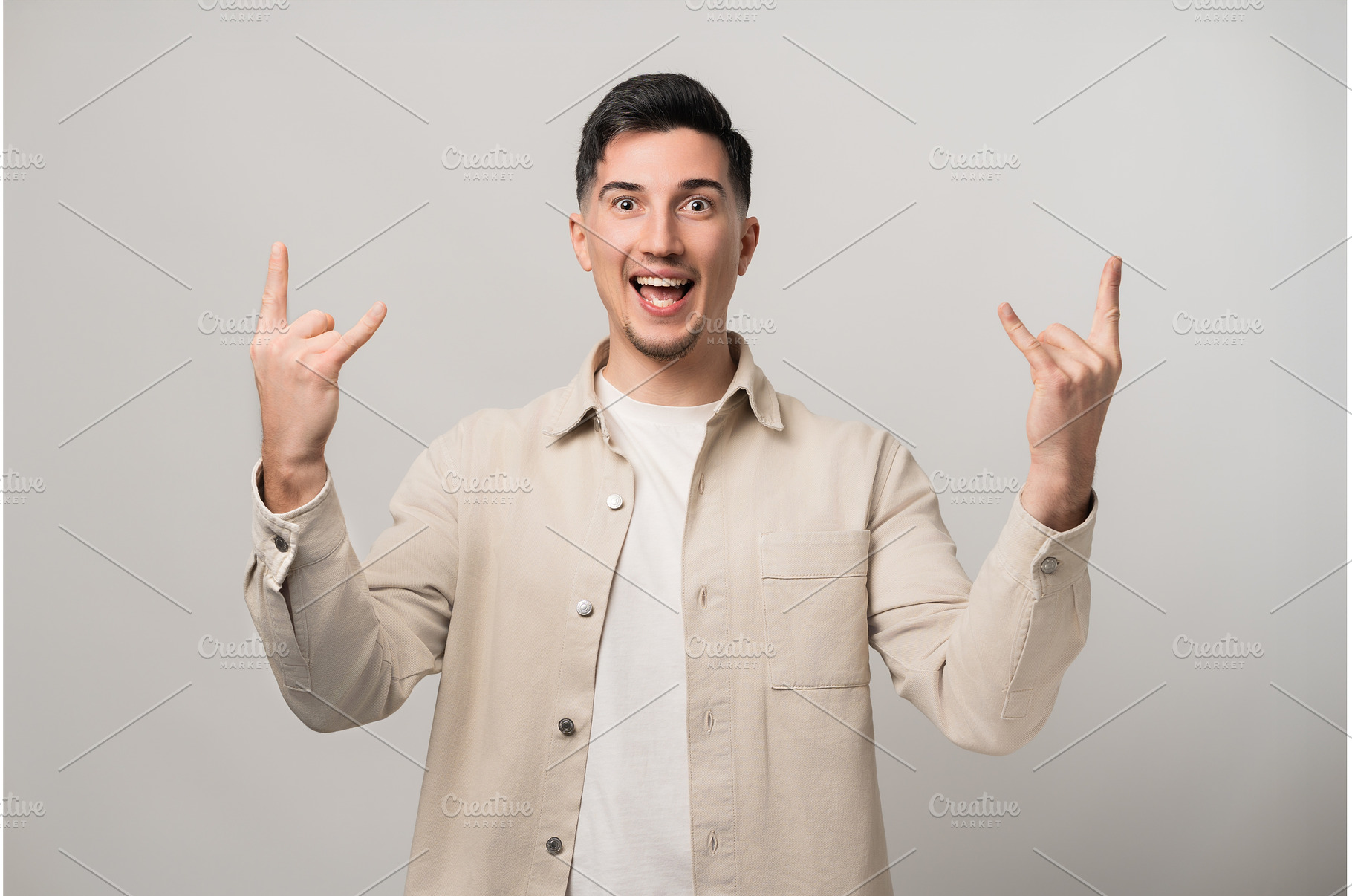 Let's rock it. Handsome brunette man, a Person Photo by AD Stock Images