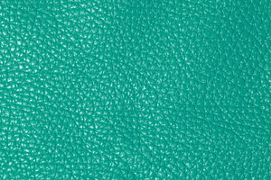 A close up full frame view of a vibrant teal colored leather tex, a Background Photo by ndanko