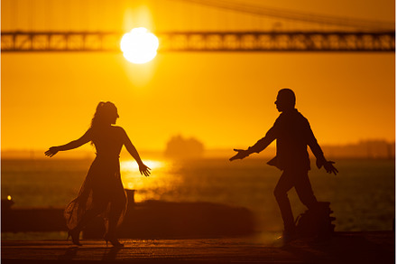 Two figures dancing on the pier at, a Person Photo by Barcelona_dreams