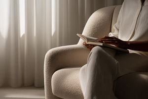 Reading a book in a bright room, a Photo by Beautiful things