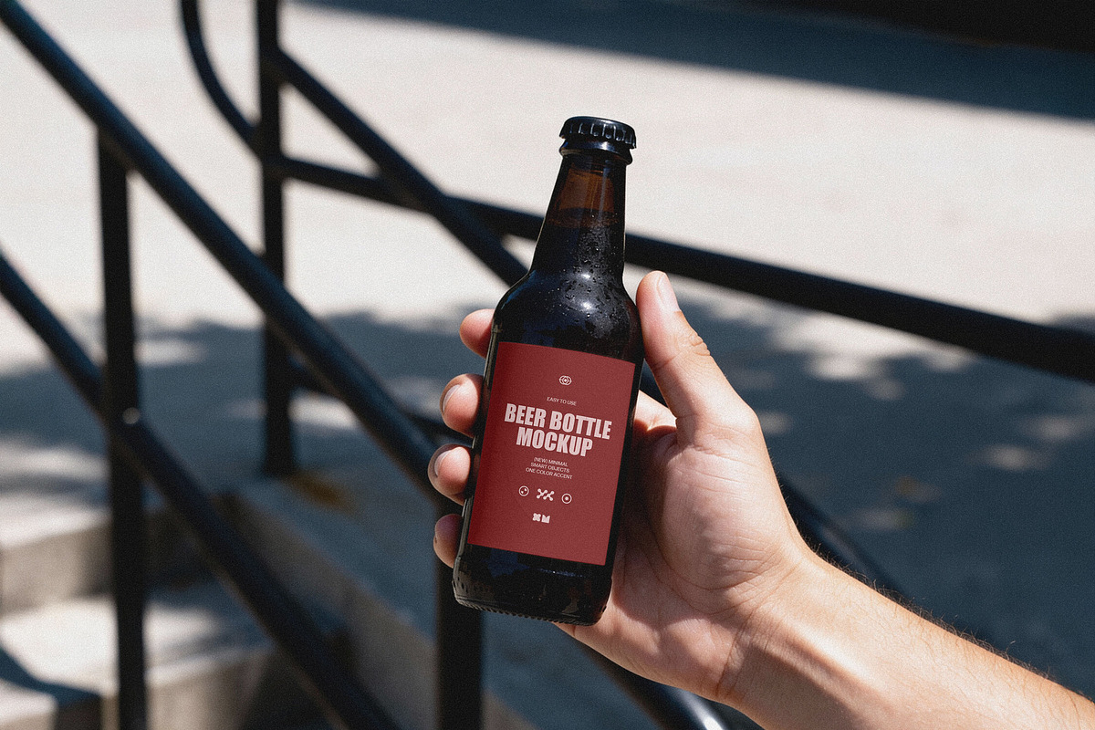 Amber Beer Bottle in Hand Mockup, a Product Mockup by Design Squad (Photo 4 of 4)