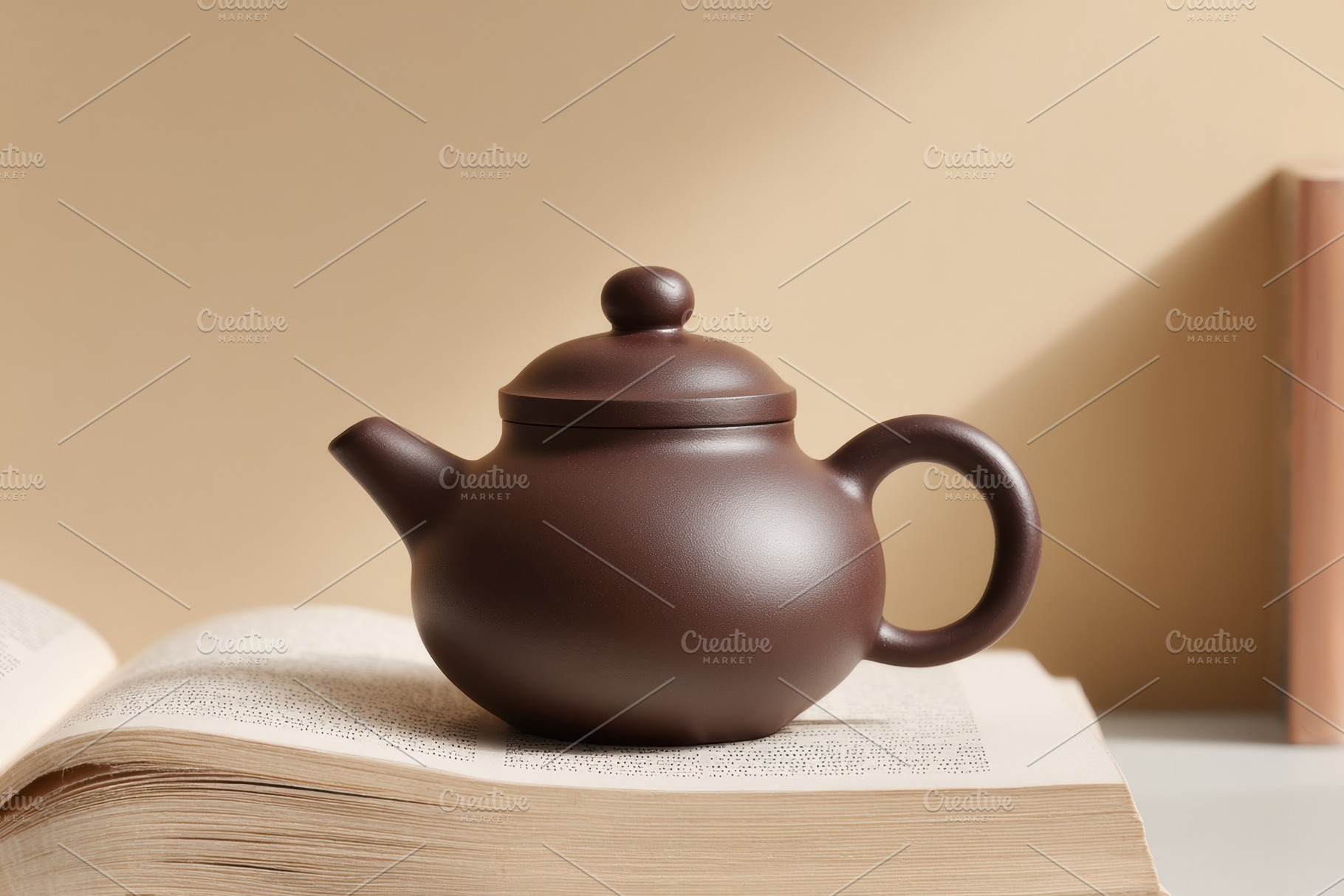 Minimalist brown ceramic teapot, a Food & Drink Photo by Virgo Studio