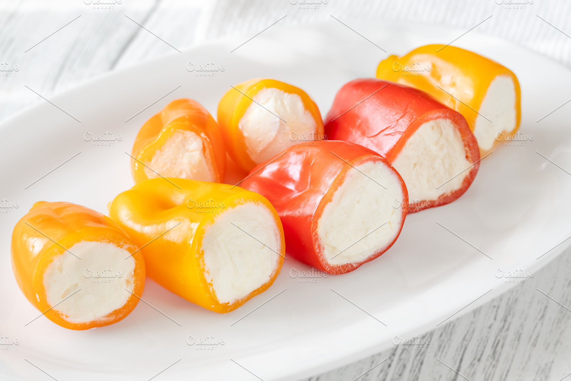 Colorful Baby Bell Peppers Stuffed W, a Food & Drink Photo by Alexander Prokopenko