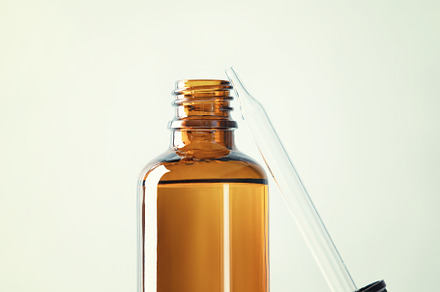 Blank transparent amber glass essential oil bottle with pipette, a Beauty & Fashion Photo by Natalia Klenova's Shop