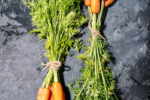 Bunch of fresh carrots with green le stock photo containing carrot and organic
