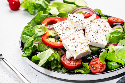 Greek salad with feta cheese, black olives, tomatoes, paprika, c, a Food & Drink Photo by 5PH