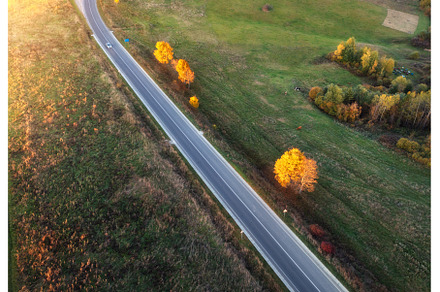 Aerial view of winding road in, a Transportation Photo by den-belitsky