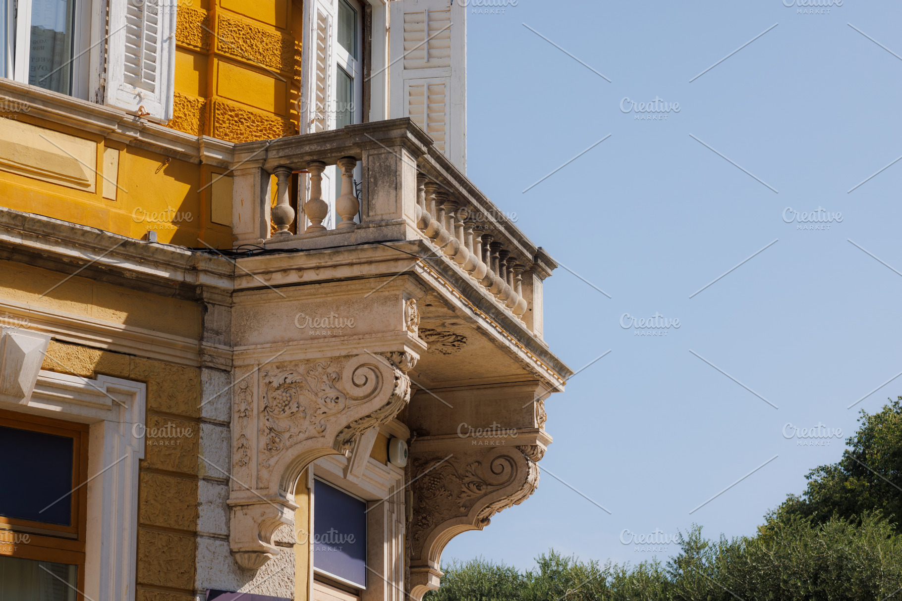 Ancient balcony decorated with ornamental stone elements, Pula. Croatia, an Architecture Photo by Bepslabor
