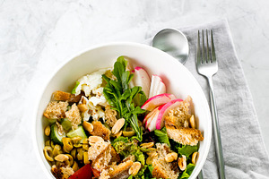 Healthy salad bowl stock photo containing food and mozzarella