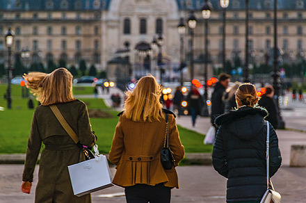 Women walking at paris street, a Person Photo by DanFLCreativo