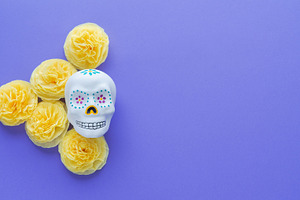 Mexican skull with yellow flowers