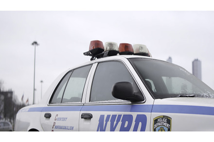 Nypd police car parked on city, a Transportation Photo by Media Whale Stock