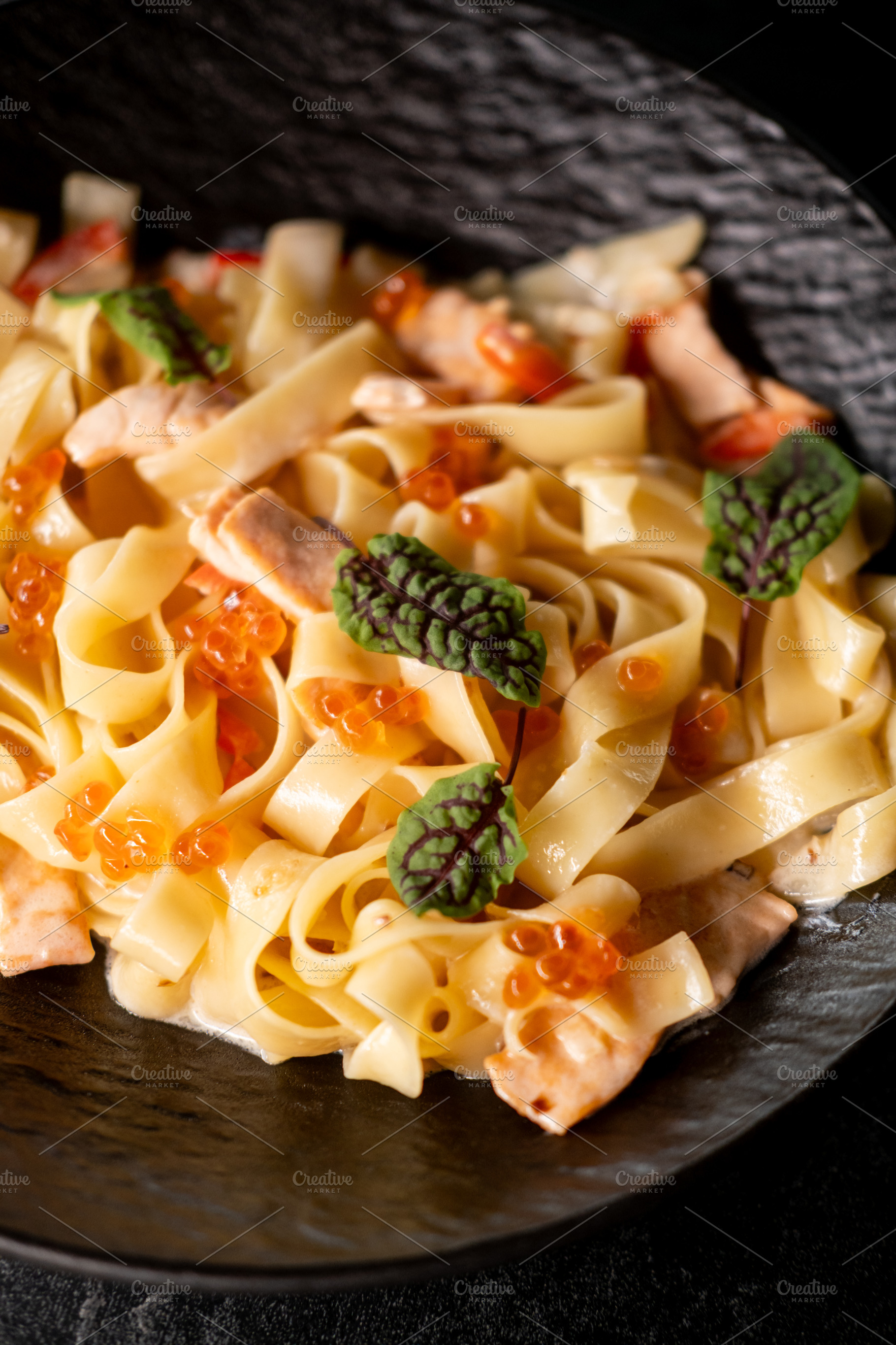 Noodle serving fish dish dining salmon red caviar, a Food & Drink Photo by Photo Drive Studio