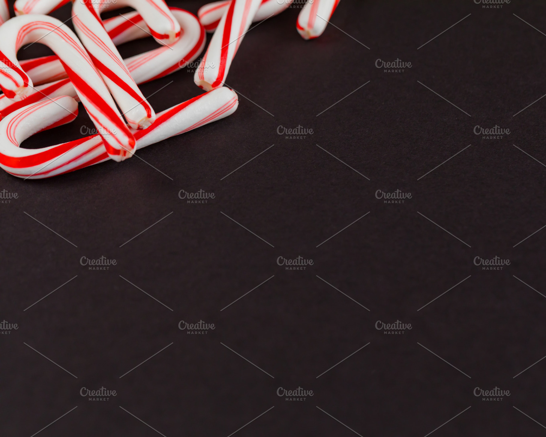 Candy Canes on chalkboard, a Holiday Photo by kissandmockup